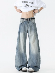 Light blue washed wide-leg baggy denim jeans with vintage faded texture and street style