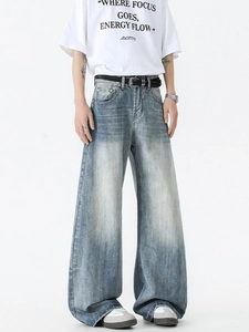 Vintage washed blue wide leg denim jeans for men with relaxed fit and cat-whisker texture