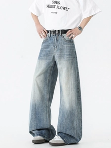 Men's wide-leg light blue washed denim jeans with vintage distressed finish and loose fit