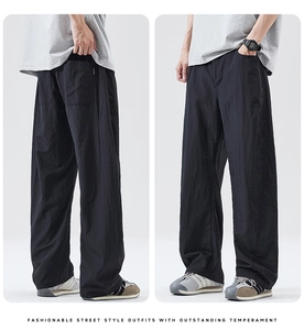 Vorder- und Rückansicht der schwarzen Herren-Streetwear-Hose mit weitem Bein aus Lyocell