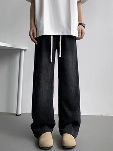 Men's wide-leg charcoal denim jeans with elastic drawstring waist and loose straight fit
