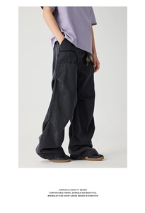 Detail of American vintage wide-leg cargo pants with unique 3D pleated leg design
