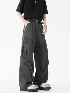 Vintage cargo flare pants for men featuring washed charcoal grey fabric and multi-pocket design