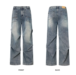 Front and back view of blue washed cargo jeans with side ruching and utility pockets