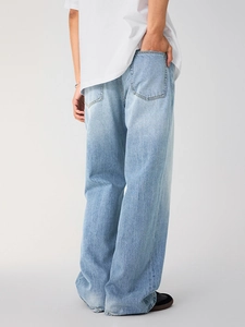 Men's light blue washed vintage straight leg jeans with loose fit denim texture