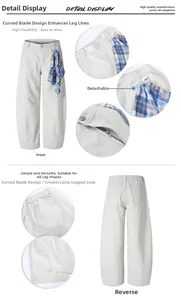 Detail of loose fit trousers with detachable plaid handkerchief and curved cut design