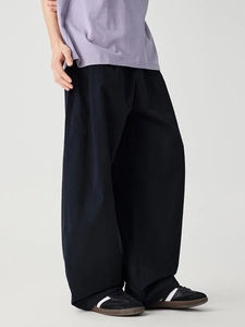 Men's high street black wide-leg trousers with pleated details and relaxed fit silhouette