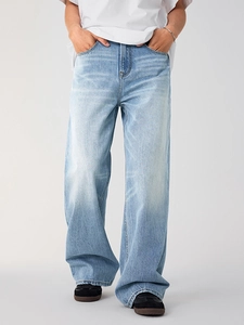Men's light blue vintage washed straight wide leg jeans in a relaxed street style fit