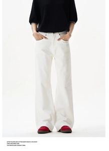 Detail shot of white high-waist flared pants featuring rivet accents and loose fit