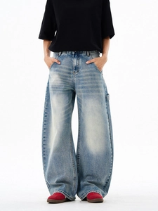 Men's baggy street style light blue washed denim jeans with a retro wide leg cut