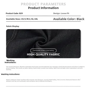 Detail of black denim fabric texture and sizing chart for loose fit vintage jeans