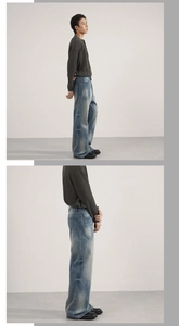Detail view of retro washed blue flare jeans showing whiskering and vintage texture