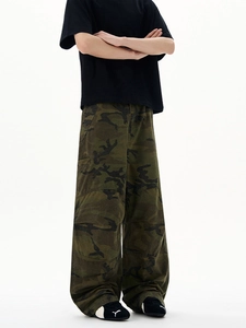 Men street style outfit with black t-shirt and loose camouflage cargo pants on white background
