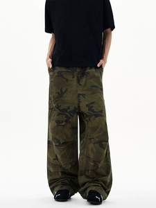 Men's oversized woodland camouflage cargo pants with wide-leg cut and paneled design