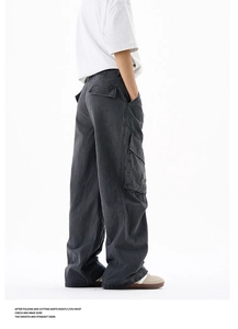 Detail view of charcoal cargo pants with side 3D pockets and vintage washed finish