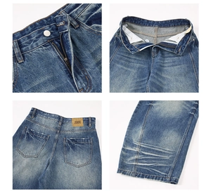 Detail view of vintage washed blue jeans featuring metal zipper and leather brand patch