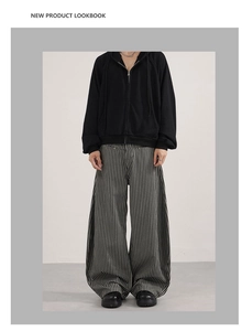 Close-up of American retro striped wide-leg trousers with premium drape and loose fit