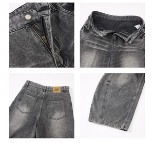 Detailansicht von Beschlägen, Nähten und Waschtexturen bei grauen Curved-Jeans