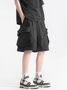 Men's loose cargo shorts with oversized pockets and long decorative belt in black