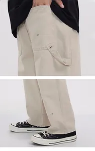 Detail view of the unique crescent back pocket stitching and comfortable straight hem cuff