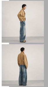 Détail d'une veste de travail kaki et d'un jean large délavé au style rétro vintage