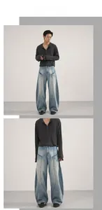 Detail view of baggy wide-leg jeans with 3D panelled stitching and vintage blue wash style