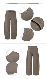 Detailansicht der khakifarbenen Baumwollhose mit Taschen, Reißverschluss und weitem Bein