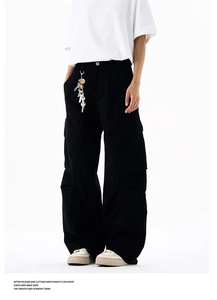 Detail of high street cargo pants with multi-pocket design and industrial style stitching