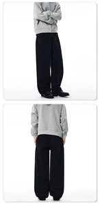 Vorder- und Rückansicht der schwarzen Baggy-Baumwollhose für Herren im Deconstructed-Stil