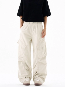 Men's and women's vibe style distressed cargo pants with multi-pocket wide leg design