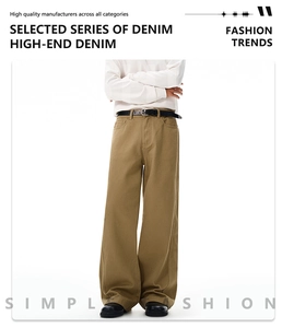 Detail view of khaki cotton wide-leg pants with high waist and vintage loose fit