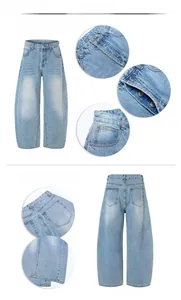 Detailed close-up of light blue washed denim pants featuring high-waisted loose wide leg cut