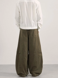 Loose fit vintage workwear trousers in dark olive green with wide leg cut for men