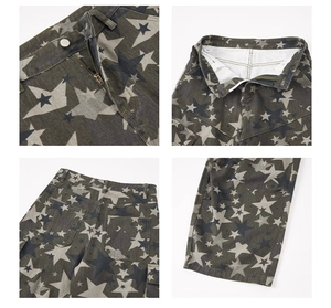 Detailed macro view of American hip hop baggy cargo pants with star print and metal zipper