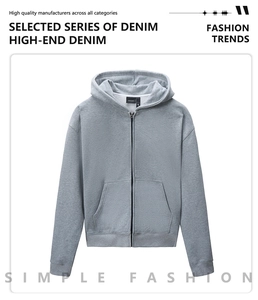 Detailed close-up of a grey zip-up hoodie featuring a drawstring hood and front pockets
