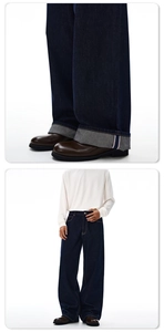 Detailansicht des Selvedge-Saums und der locker sitzenden dunkelblauen Herren-Jeans