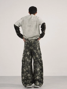 Men's high street streetwear outfit with grey star pattern baggy cargo pants and layered tee