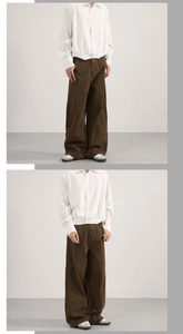 Detail view of brown wide-leg cargo pants with unique deconstructed seam stitching