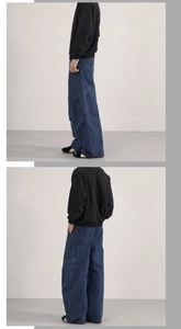 Détails du pantalon cargo vintage bleu de travail avec jambes larges et poches latérales