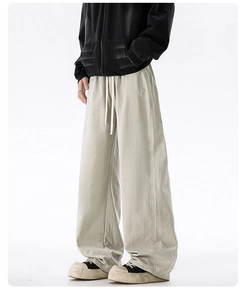 Detailed close-up showing the elastic drawstring waist and premium cotton fabric texture