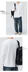 Detailed back view and full outfit of a white minimalist crewneck sweatshirt for men