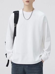 Men's white raglan sleeve crewneck sweatshirt in a casual loose fit for daily style