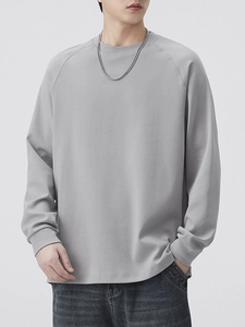 Men's light grey raglan sleeve crewneck sweatshirt in premium cotton blend knit