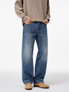 Men's straight leg loose jeans in mid-blue wash with relaxed fit for casual wear