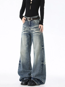 Jeans larghi lavaggio retrò da donna con baffi vintage e stile a vita alta elegante