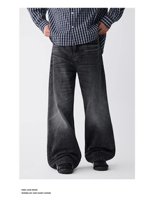 Jean large gris foncé délavé style rétro avec moustaches et coupe oversize vintage