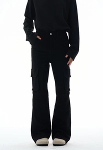 Detail of black multi-pocket cargo pants featuring high waist design and wide-leg cut