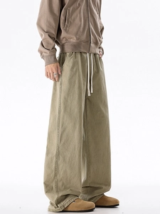 Men's olive cotton oversized cargo pants with elastic waist and relaxed straight leg