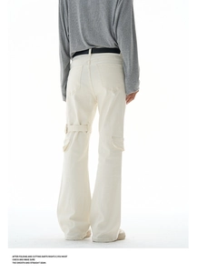 Rear view of off-white wide-leg utility jeans showing cargo pockets and textured denim