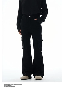 Detail view of black multi-pocket cargo flare pants with high-waist minimalist design